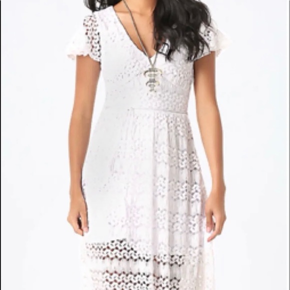 bebe Dresses & Skirts - Beautiful BeBe white crotchet maxi dress with lining.